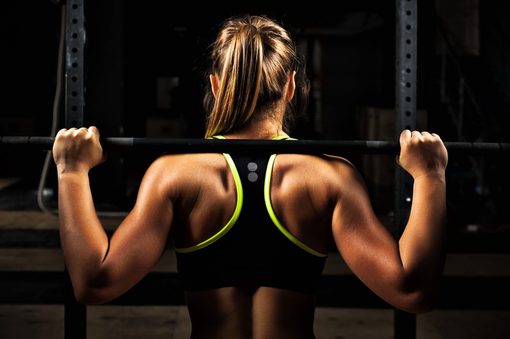 woman lifting weights